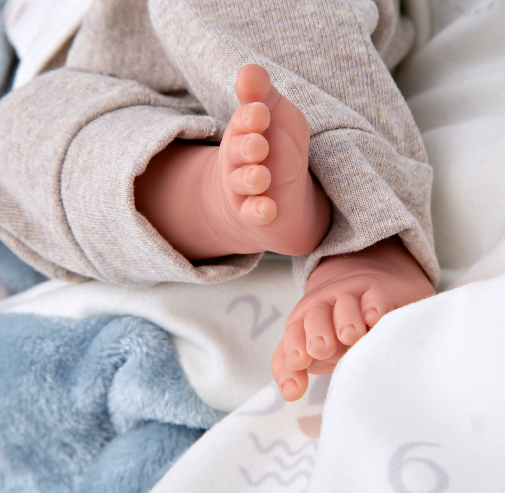 60810 Colin Blue Elegance Doll  (WEIGHTED DOLL)
